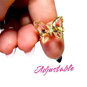 Clear coloured stone and gold plated butterfly ring